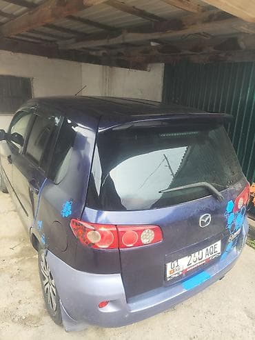 Mazda Demio: 2003 г., 1.3 л, Автомат, Бензин, Хетчбек — 3