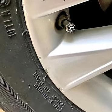 Крышки на ниппели (колпачки) для автомобильных шин с логотипом. -