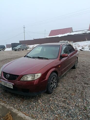 мазда 313: Mazda 323: 2003 г., 1.6 л, Автомат, Бензин, Седан — 2