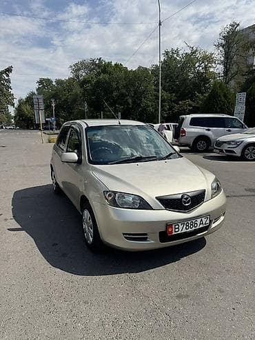 Транспорт: Mazda Demio: 2003 г., 1.3 л, Автомат, Бензин, Хэтчбэк — 1