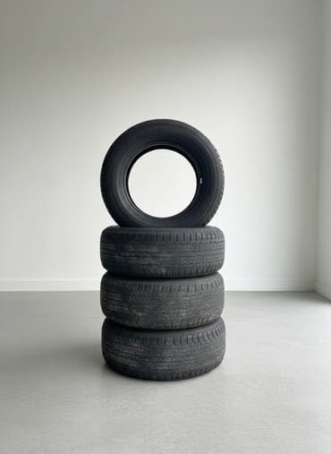 не нужные шины: Шины 265 / 60 / R 18, Зимняя шипованная, Б/у, Комплект, Внедорожные (АТ/МТ), Япония, Bridgestone — 1