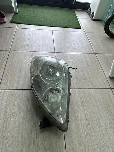 Передняя левая фара Honda 2005 г., Б/у, Оригинал, Япония at lalafo.kg Передняя левая фара Honda 2005 г., Б/у, Оригинал, Япония