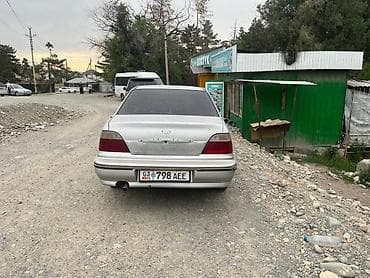 жак бу: Daewoo Nexia: 2003 г., Кол менен иштөөчү — 2