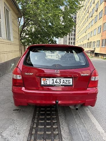x 5: Mazda 323: 1998 г., 1.5 л, Механика, Бензин, Универсал — 2
