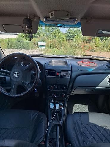 pasat b5: Nissan Almera Classic: 2004 г., Механика, Седан — 4