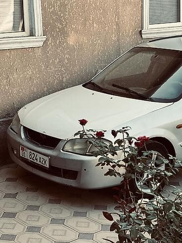 авариялык: Mazda 323: 1999 г., 1.6 л, Кол менен иштөөчү, Бензин, Хетчбек — 4