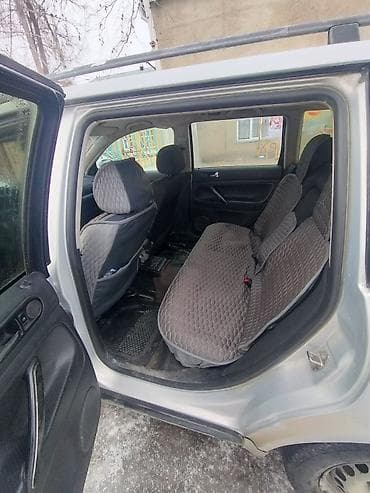 полик на авто: Volkswagen Passat: 1999 г., Автомат, Универсал — 2