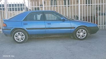 болуп: Mazda 323: 1992 г., 1.6 л, Автомат, Бензин, Хетчбек — 9