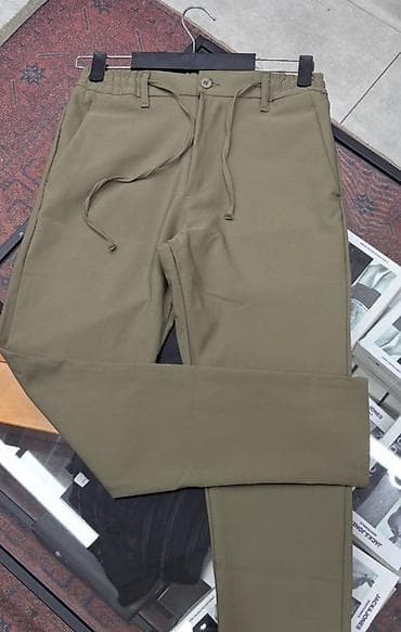 Брюки мужские, оливково‑хаки цвета. Прямой крой с небольшим сужением к lalafo.kg да Брюки мужские, оливково‑хаки цвета. Прямой крой с небольшим сужением к