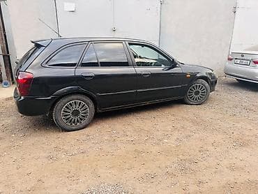 bcd com kg: Mazda 323: 2002 г., 1.6 л, Автомат, Бензин, Хэтчбэк — 6