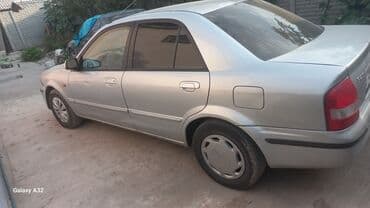 мазда кронус: Mazda 323: 2001 г., 1.6 л, Механика, Бензин, Седан — 4