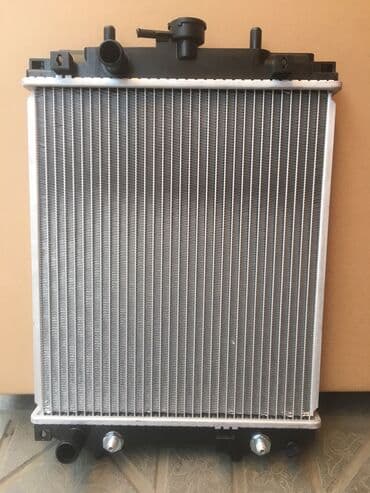 художник рисуем на: Daihatsu Cuore,Sirion,Toyota Duet.Passo.-радиатор охлаждения! — 1