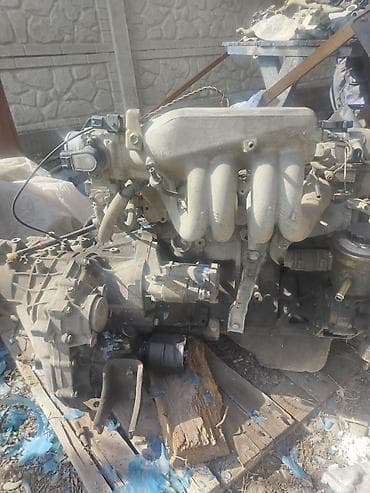 Двигатель в сборе с навесным и МКПП. Описание: - Бензиновый рядный