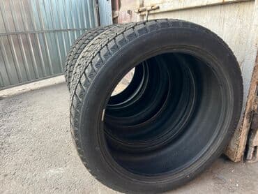 зимние шины на ниву 21214: Шины 265 / 45 / R 21, Зима, Комплект, Япония, Bridgestone — 6