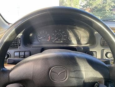авто подборщик: Mazda 626: 1998 г., 2 л, Механика, Бензин, Седан — 8