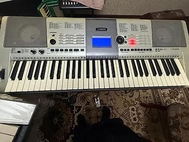 Синтезатор Yamaha PSR-E403 - Клавиатура: 61 полноразмерная клавиша с