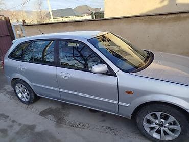 амортизатор нексия 1: Mazda 323: 2002 г., Механика, Бензин, Универсал — 5
