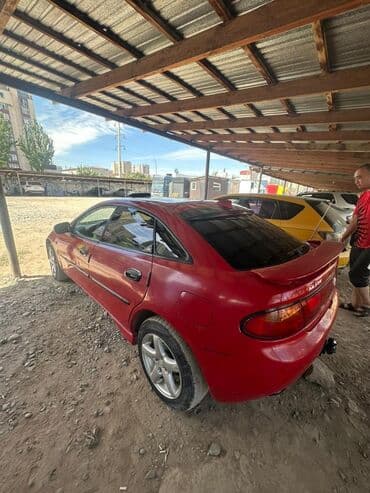 обмен на частный дом: Mazda 323: 1995 г., 1.5 л, Механика, Бензин, Хэтчбэк — 4