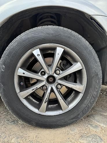 Литые диски R14 (кажется 4/100) с шинами Dunlop - Комплект колес на — 4