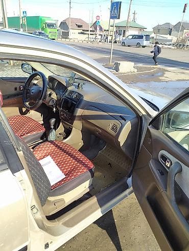 echo platz: Mazda 323: 2000 г., 1.5 л, Механика, Бензин, Седан — 5