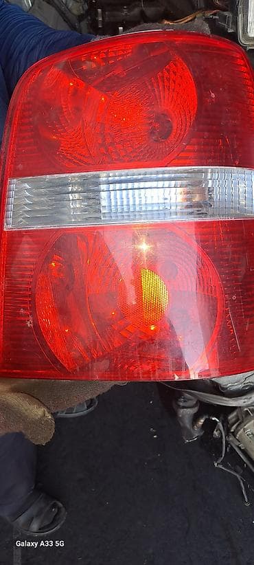 step rf3: Задний фонарь (левый) для автомобиля Volkswagen Caddy 3 (2004–2010 — 1