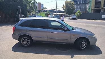 Mazda Familia: 2003 г., 1.6 л, Механика, Бензин, Универсал — 3