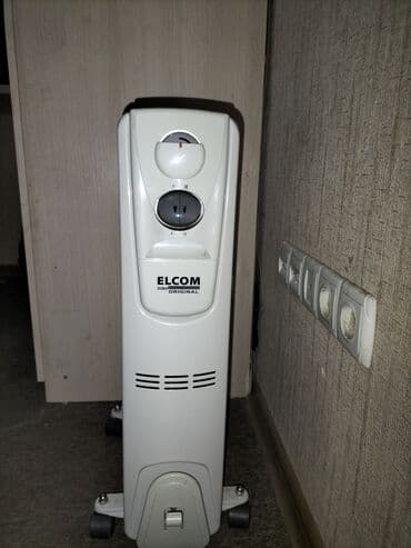 современные обогреватели: Масляный обогреватель Кол-во секций: 10 и более, Быстрый нагрев — 1