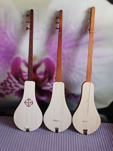 Дорогой друг, если Вы покупаете комуз впервые, то не обращайте