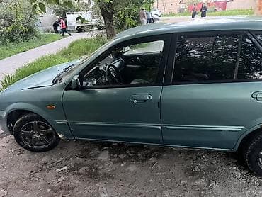 15 демио: Mazda 323: 2002 г., 1.6 л, Механика, Бензин, Хэтчбэк — 4