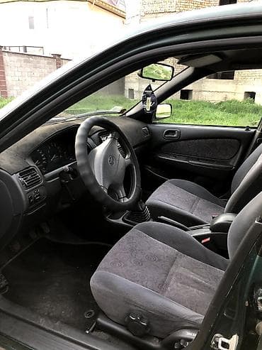 Унаа сатуу: Toyota Corolla: 1999 г., 1.6 л, Кол менен иштөөчү, Бензин, Хетчбек — 7