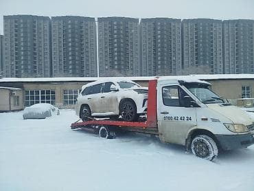 Услуги эвакуатора: С манипулятором, С лебедкой, С ломаной платформой — 1