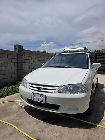 одиссей сиденья: Honda Odyssey: 2000 г., 2.3 л, Автомат, Минивэн — 7