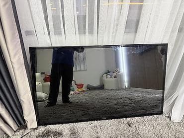 Телевизор Samsung Smart TV, диагональ 65". Плоская LED-панель с