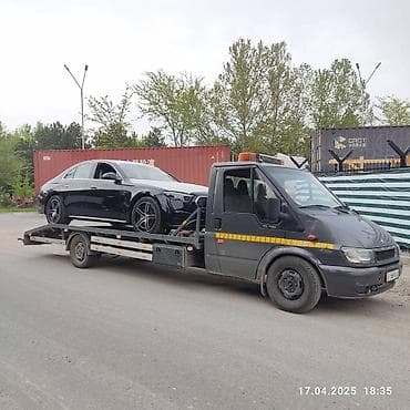 Услуги эвакуатора: С манипулятором, С лебедкой, С ломаной платформой — 1