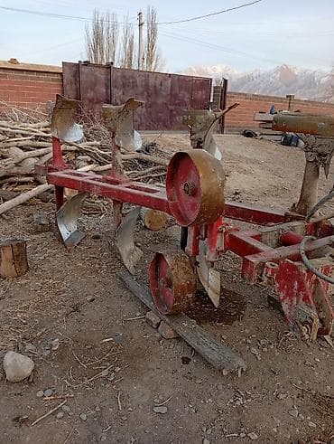 Оборотный плуг для трактора - Конструкция: навесной оборотный плуг на