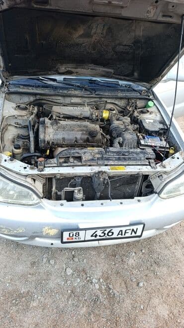 домкрат 5 тон: Kia Clarus: 1998 г., 1.8 л, Механика, Бензин, Седан — 3