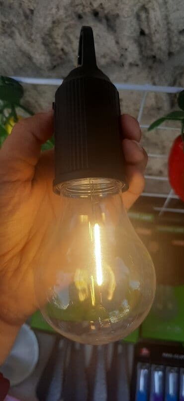 уличные прожекторы: Лампочки светильники. Пластик. Заряжающиеся. Три режима. Яркий — 4