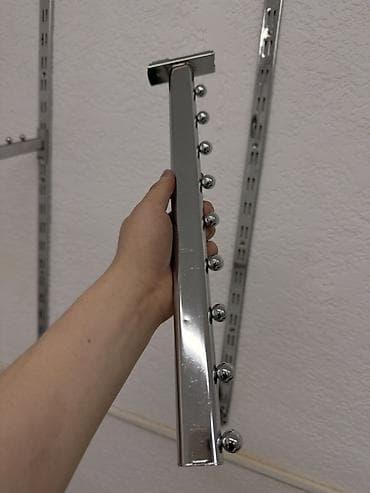 настенный: Настенная система торговых кронштейнов для одежды - Модульная — 4