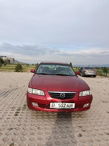 down pipe: Mazda 626: 2000 г., 2 л, Механика, Бензин, Хэтчбэк — 5