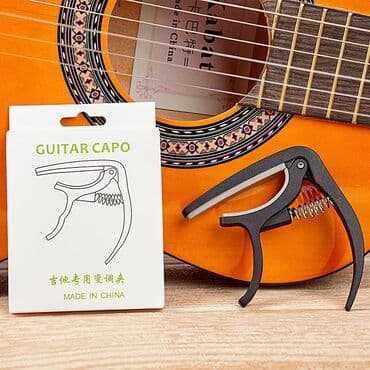 цветные струны для акустической гитары: У нас в продаже имеются Каподастры струны, напальчники, медиаторы — 1