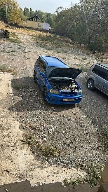 авто масла: Subaru Forester: 2002 г., 2 л, Автомат, Универсал — 6
