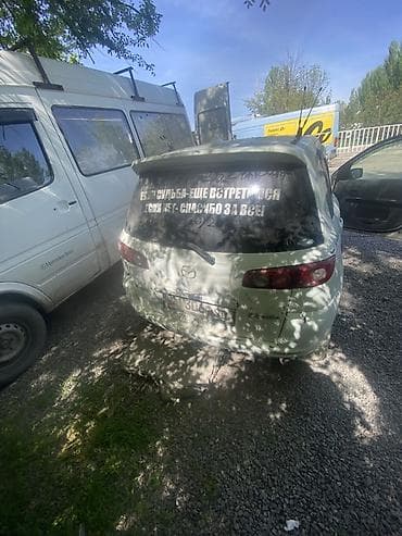 Mazda Demio: 2003 г., 1.3 л, Автомат, Бензин, Хэтчбэк