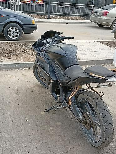 Спортивный мотоцикл в обвесе «спортив» черного цвета. Основные — 5