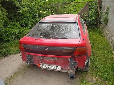 Mazda MX-3: 1997 г., Механика, Купе