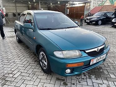 Mazda 323: 1996 г., 1.6 л, Автомат, Газ, Седан