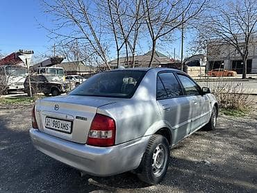 ravon 3: Mazda 323: 2003 г., 1.6 л, Механика, Бензин, Седан — 2