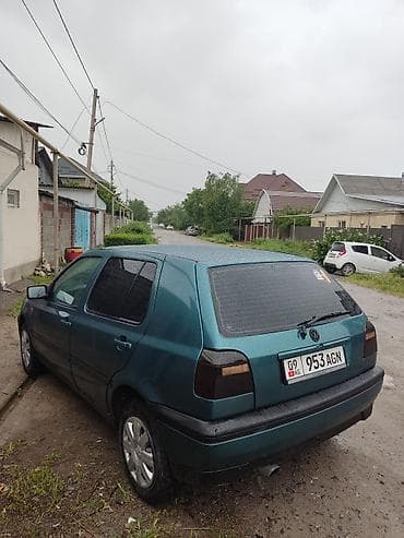 семейный авто: Volkswagen Golf: 1994 г., 1.8 л, Механика, Бензин, Хэтчбэк — 4
