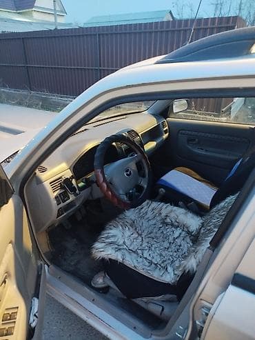 Mazda: Mazda Demio: 2000 г., 1.5 л, Механика, Бензин, Хэтчбэк — 1