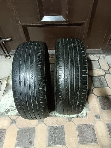 155 13: Пара летних шин 235/60R18
цена за комплект — 1