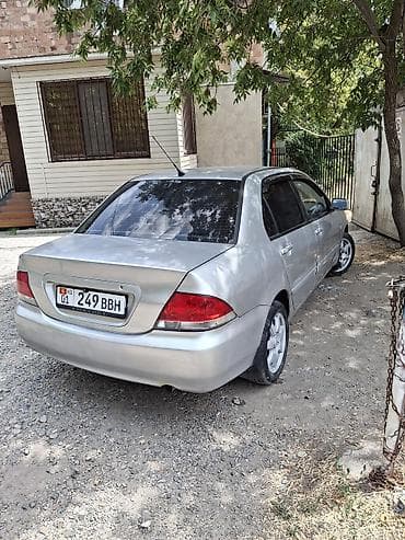 Транспорт: Mitsubishi Lancer: 2007 г., 1.6 л, Вариатор, Бензин, Седан — 1